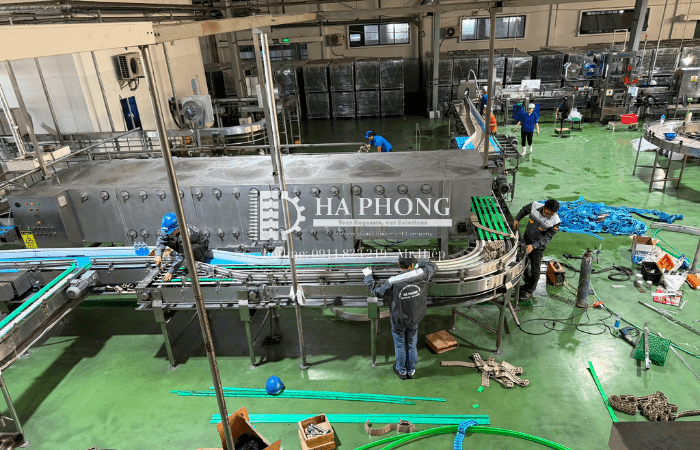 Dự án thực tế: Cải tạo dây chuyền băng tải trước hầm thanh trùng cho nhà máy nước đóng chai